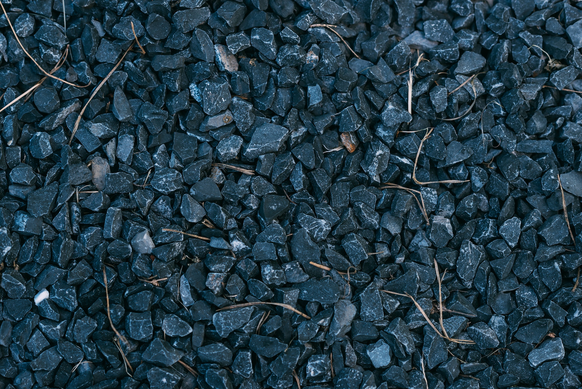 close up of background with black stones or gravel